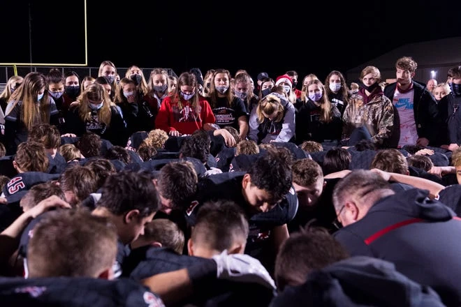 Southridge students support the football team as Southridge head coach Scott Buening gives his final words on the season after losing the Class 3A semi-state game to the Danville Warriors in Huntingburg, Ind. , Friday night, November 20, 2020. Danville won 7-30. Danville won 30-7.