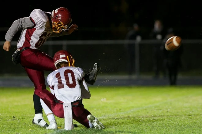 Alex Mendoza (60) from Scecina kicks the ball during the first quarter of an IHSAA regional championship class 2a soccer match on Friday, November 12, 2021 in Lafayette.