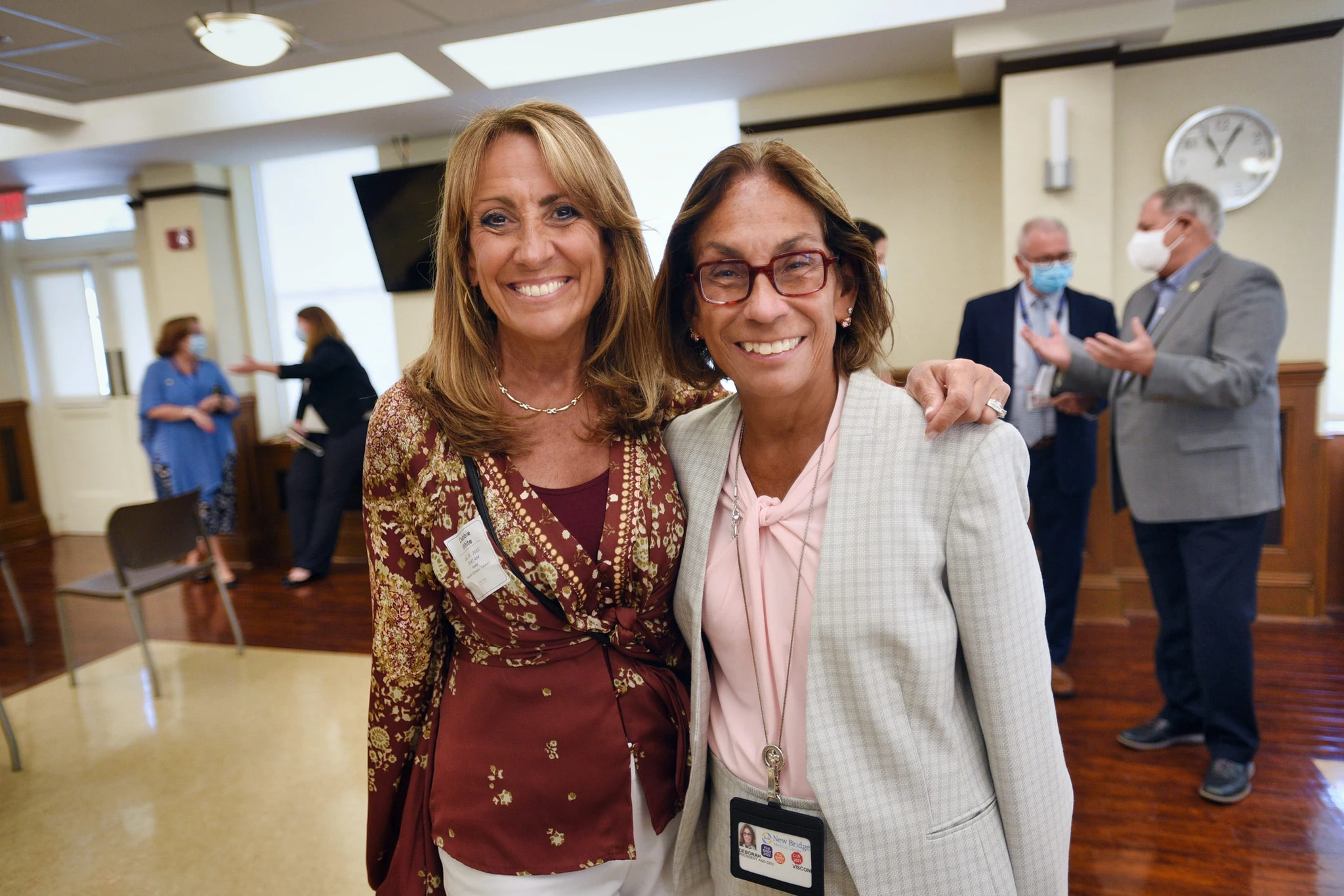 Debbie White (L), president of the Health Professionals and Allied Employees Union, and Deb Visconi (R), president of Bergen New Bridge Medical Center, pose together before the signing ceremony of a three-year contract for 500 nurses at Bergen New Bridge in Paramus, July 27, 2022. (Photo: Mitsu Yasukawa/ Northjersey.com)