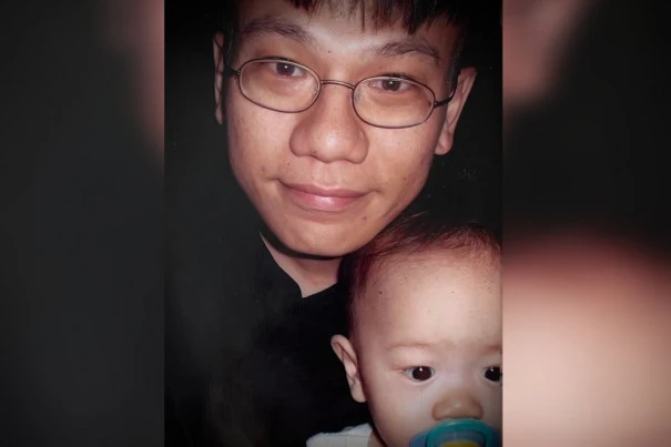 Glenn and his eldest son in 2001