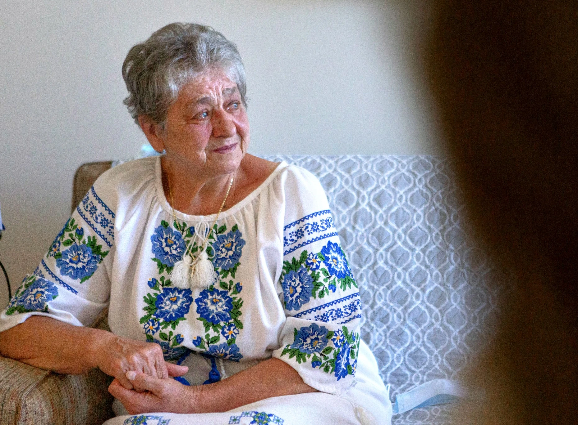 PALO ALTO, CALIFORNIA - JULY 27: Maslianchuk Mariia cries as she shares the story of the Ukrainian War in their new apartment at Moldaw Residences on Wednesday, July 27, 2022. (Wangyuxuan Xu/Bay Area News Group)
